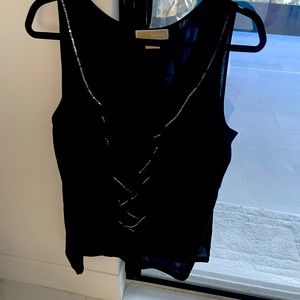Super cute Black with sequence MK top.